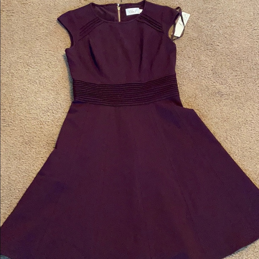 A dark purple dress.